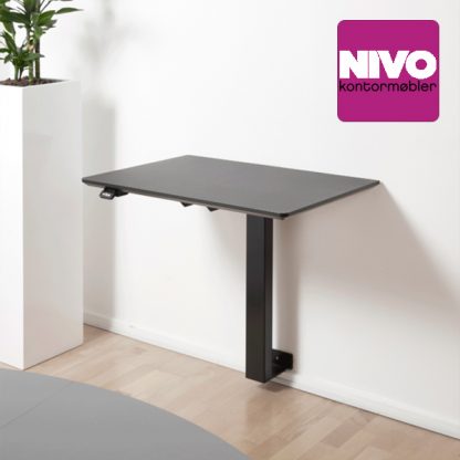 Billede af Vægmonteret hæve sænkebord er en god løsning på et lille arbejdsbord, der ikke virker for kompakt.